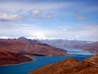 http://www.chinatourguide.com/china_photos/tibet/Attractions/Tibet_yamdroktso_lake_blue_water_brown_mountain.JPG